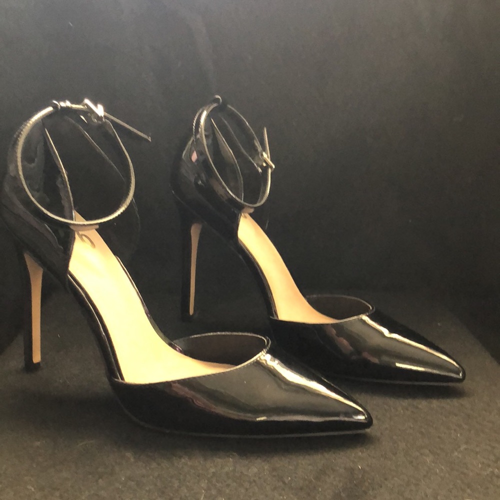 Sexy black patented leather heels w/ ankle strap.